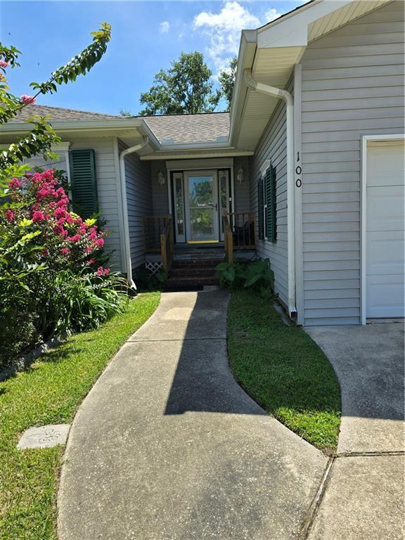 doorway to property featuring a garage