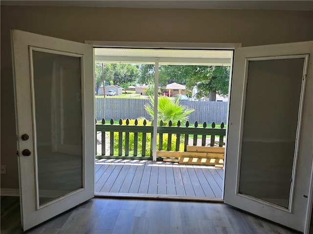 doorway to outside with hardwood / wood-style floors