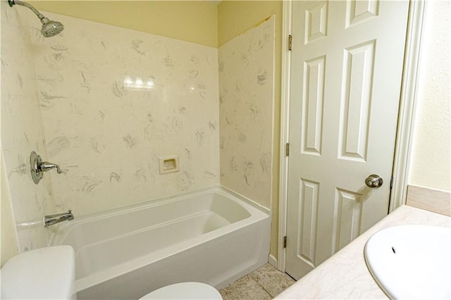 full bathroom featuring tile floors, vanity, toilet, and tub / shower combination