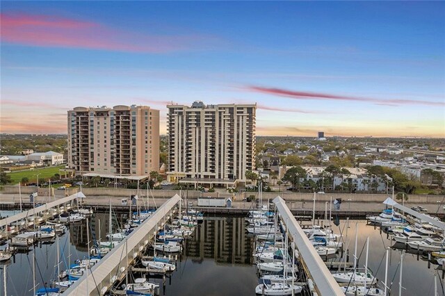 aerial view at dusk with a water view