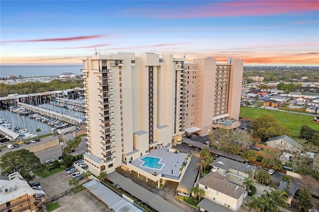 aerial view at dusk with a water view