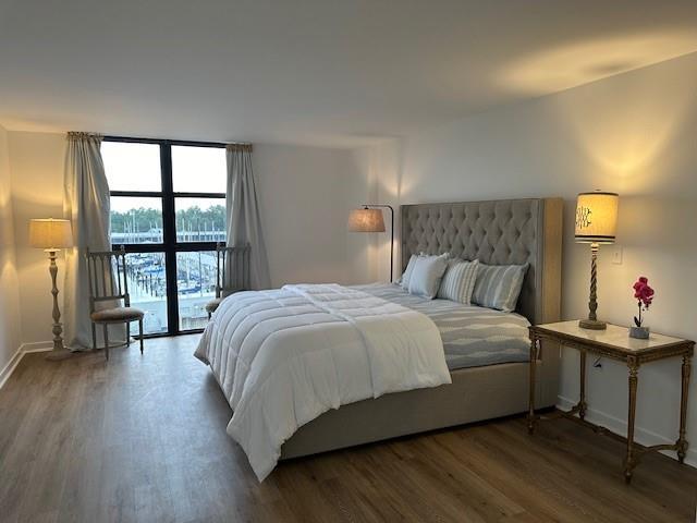 bedroom featuring dark hardwood / wood-style floors