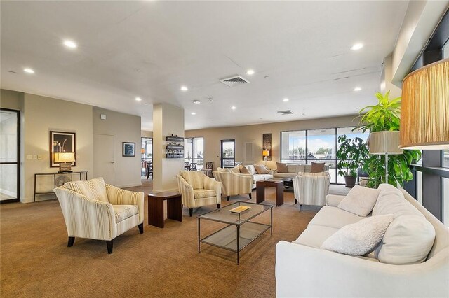 exercise room with a paneled ceiling