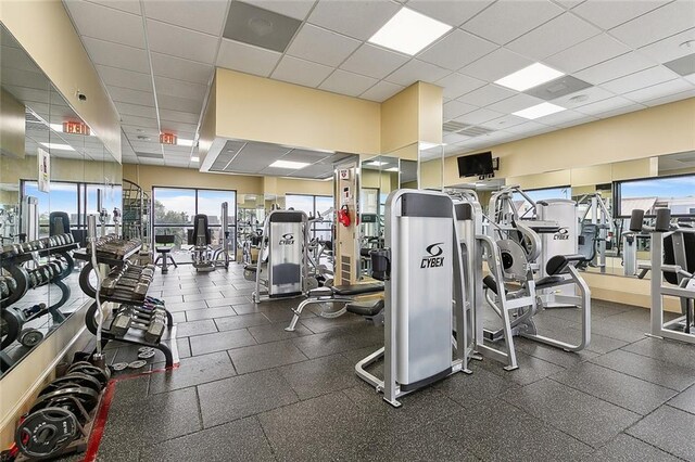 workout area with a drop ceiling