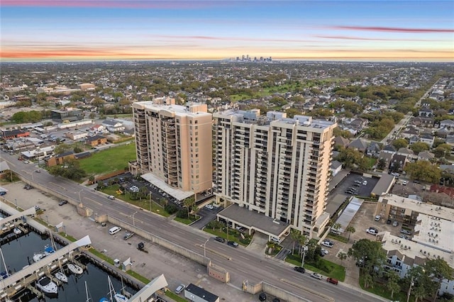 bird's eye view featuring a view of city and a water view