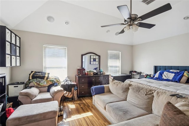 bedroom featuring wood-type flooring, ceiling fan, and lofted ceiling