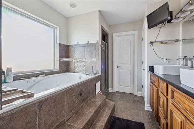 bathroom featuring tile floors and vanity