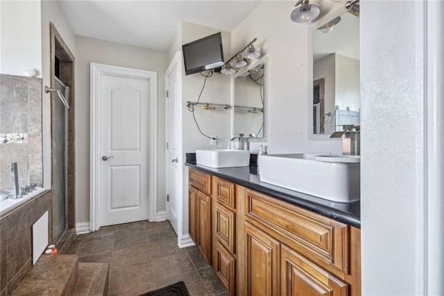 bathroom featuring double sink vanity and tile floors