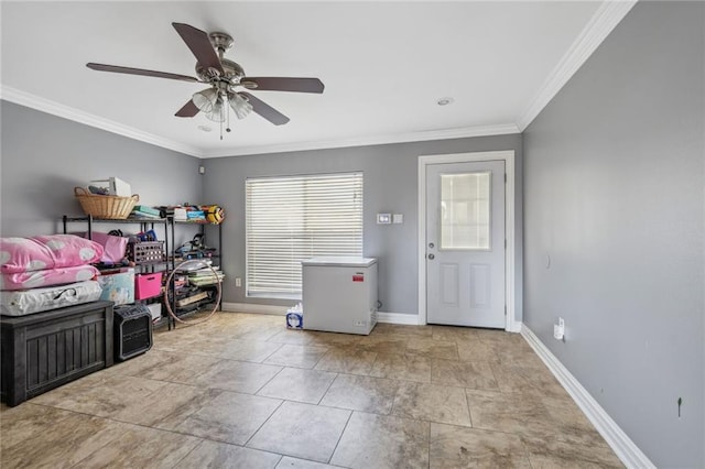 interior space featuring ornamental molding, ceiling fan, and light tile floors