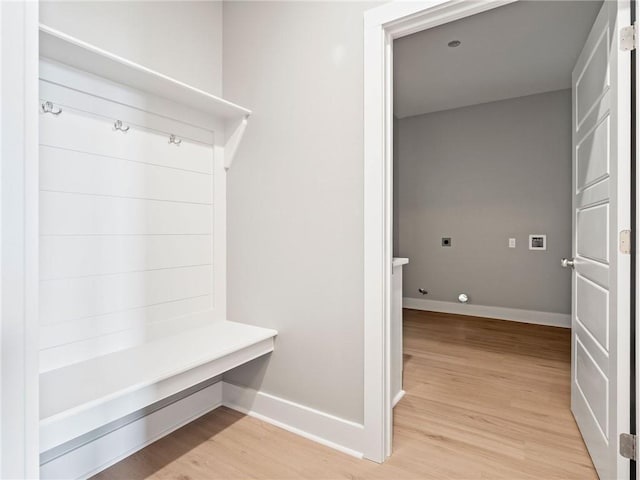 mudroom with light hardwood / wood-style floors