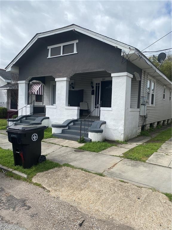 bungalow-style home featuring covered porch