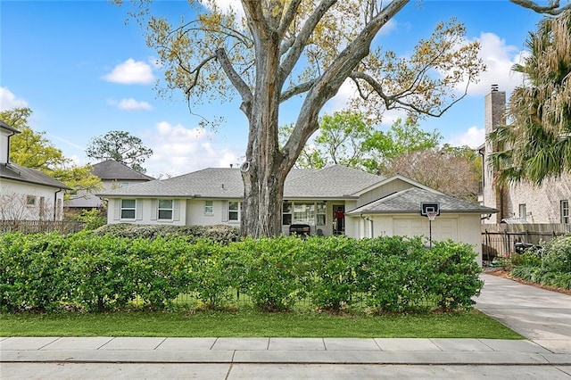 single story home with a garage