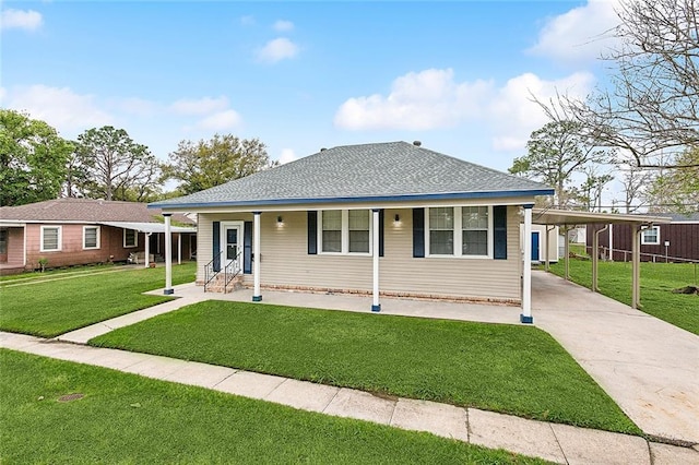 view of front facade featuring a carport and a front lawn