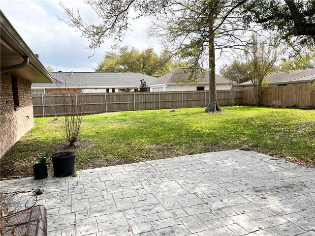 view of yard with a patio area