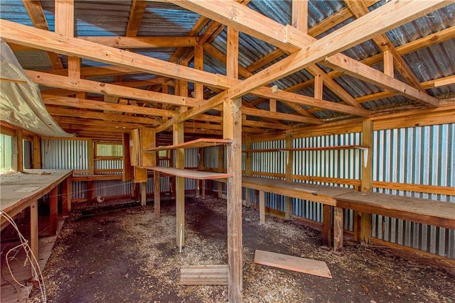 miscellaneous room with lofted ceiling