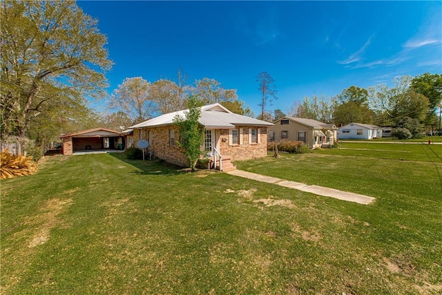 back of property featuring a lawn