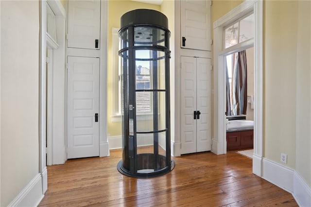 entrance foyer with hardwood / wood-style floors