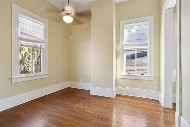 spare room with ceiling fan and light hardwood / wood-style floors