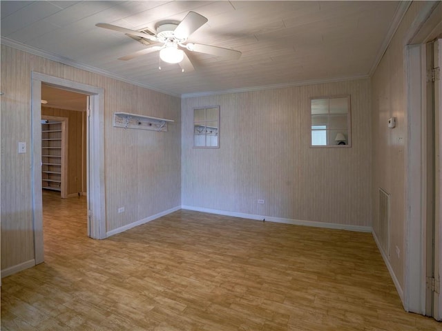 unfurnished room featuring ceiling fan, ornamental molding, and light hardwood / wood-style flooring