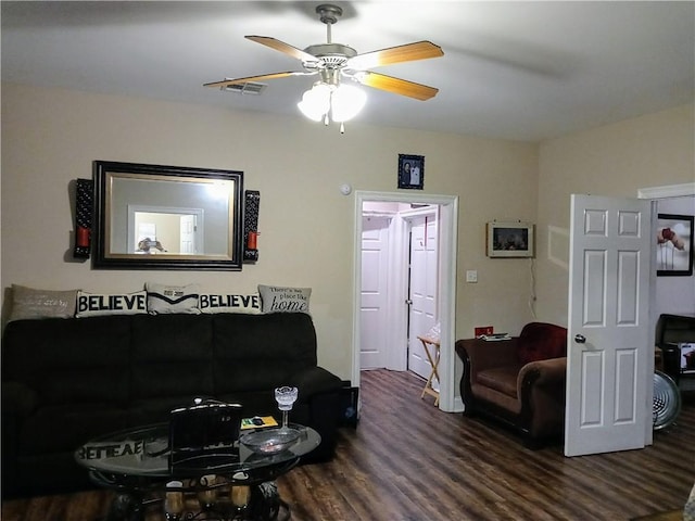 living room with hardwood / wood-style floors and ceiling fan