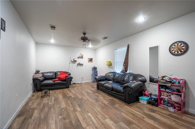 12461 Wardline Rd, Hammond, LA 70401 - living room with ceiling fan and hardwood / wood-style flooring