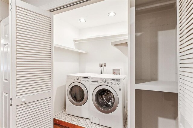 laundry room featuring independent washer and dryer