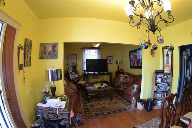 living room featuring hardwood / wood-style floors and a chandelier