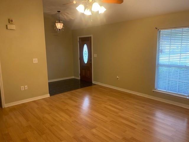 2415 Biron St, Mandeville, LA 70448 - foyer with a ceiling fan and wood finished floors