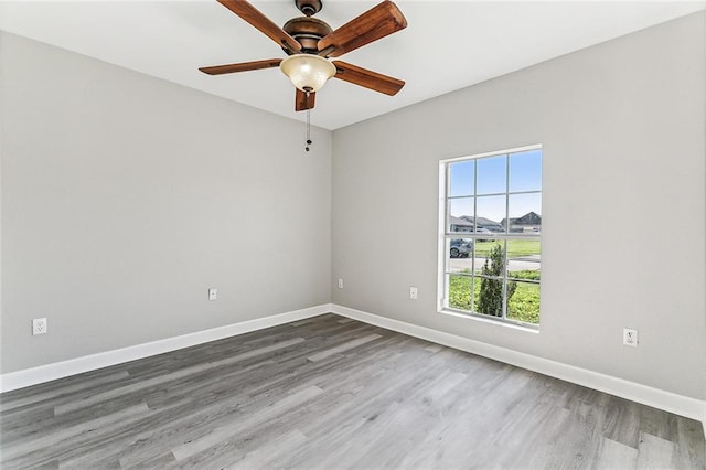 unfurnished room featuring wood-type flooring and ceiling fan