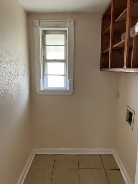 laundry room with hookup for a washing machine and tile patterned floors