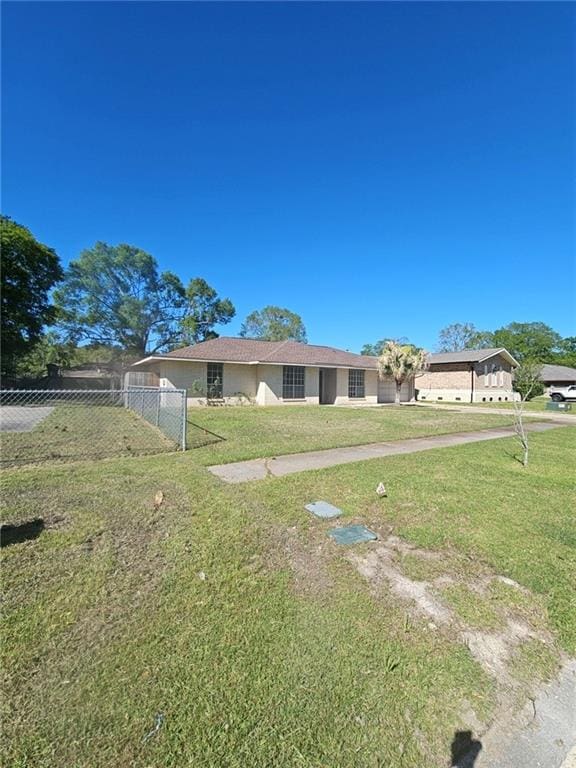 exterior space with a front lawn