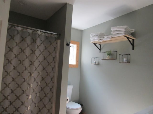 bathroom featuring toilet