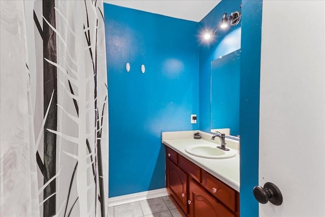 bathroom featuring tile floors and oversized vanity