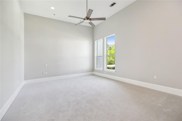 carpeted empty room with ceiling fan