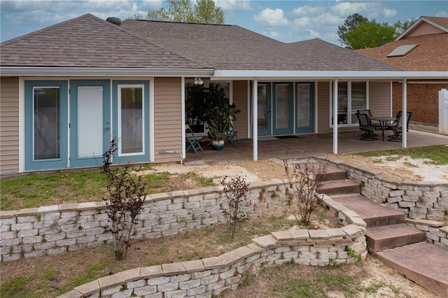 rear view of house featuring a patio