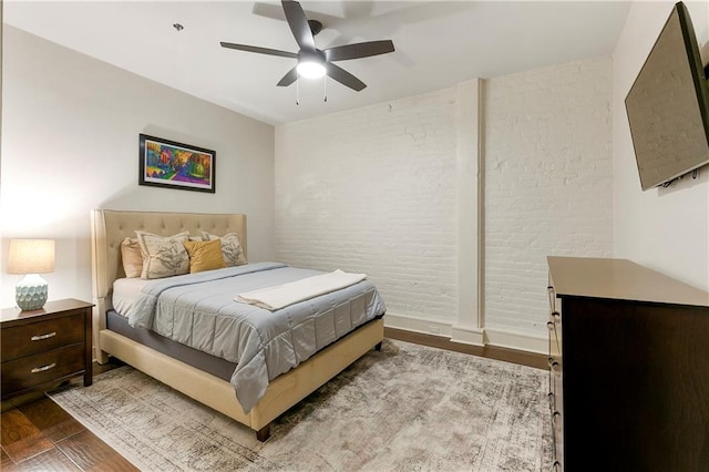 bedroom featuring ceiling fan and light wood-type flooring