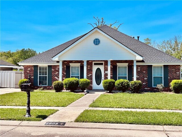 view of front of home with a front yard