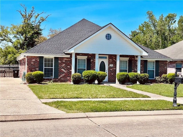 view of front of house with a front lawn