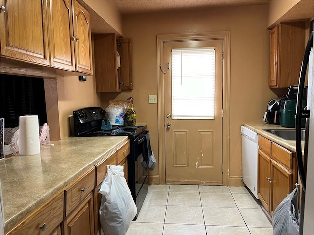 kitchen with white dishwasher, light tile floors, and black range with electric stovetop