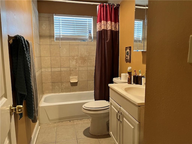 full bathroom with tile flooring, vanity, toilet, and shower / bathtub combination with curtain