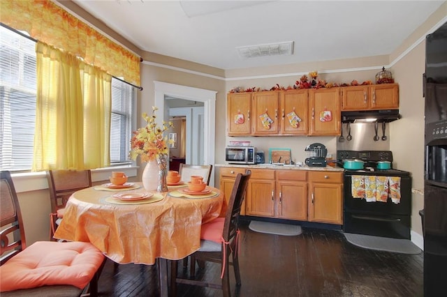 kitchen with black fridge with ice dispenser, range with electric stovetop, and dark hardwood / wood-style flooring