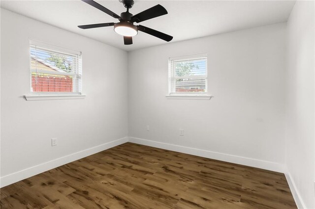 empty room featuring wood-type flooring and ceiling fan