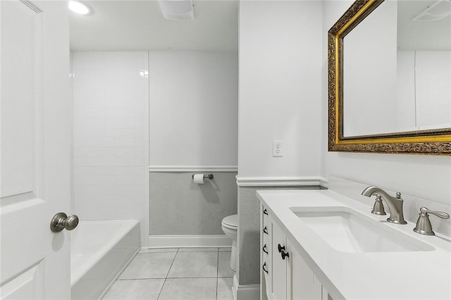 full bathroom with washtub / shower combination, tile flooring, large vanity, and toilet