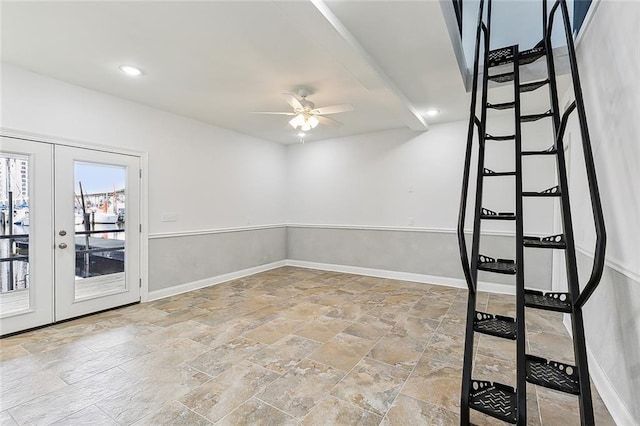 interior space featuring french doors and ceiling fan