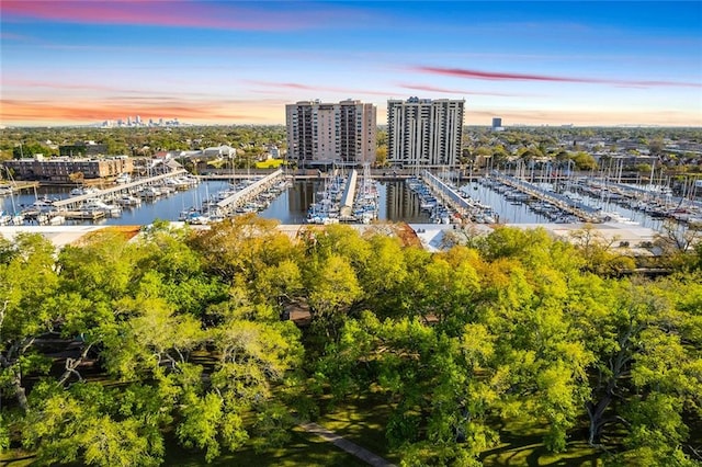 aerial view at dusk with a water view