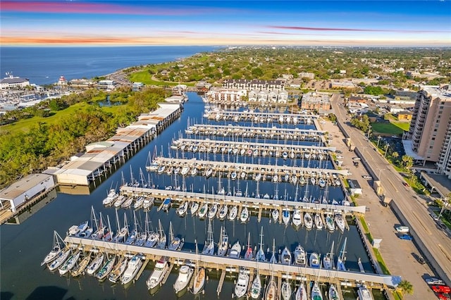 aerial view at dusk with a water view