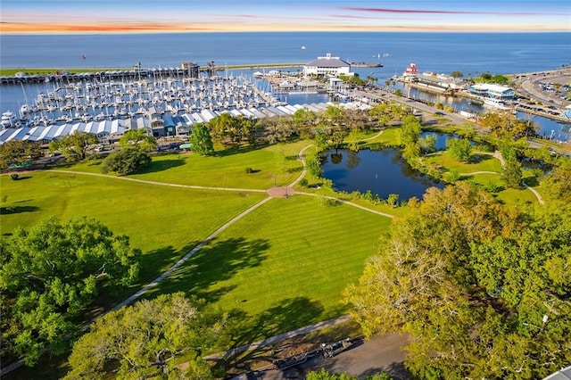 aerial view at dusk with a water view