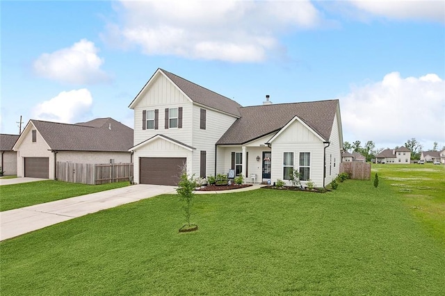 modern farmhouse style home featuring a garage and a front lawn