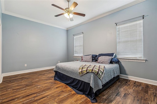 bedroom with multiple windows, ceiling fan, crown molding, and dark wood-type flooring