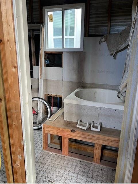 bathroom with tile floors